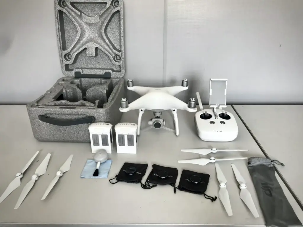 DJI Phantom 4 Fly-more Kit Drone with all equipment laid out